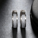 Load image into Gallery viewer, Matted stainless steel earrings
